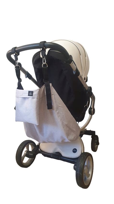 Ergonomické madlo a bezpečnostné pásy kočíka Britax