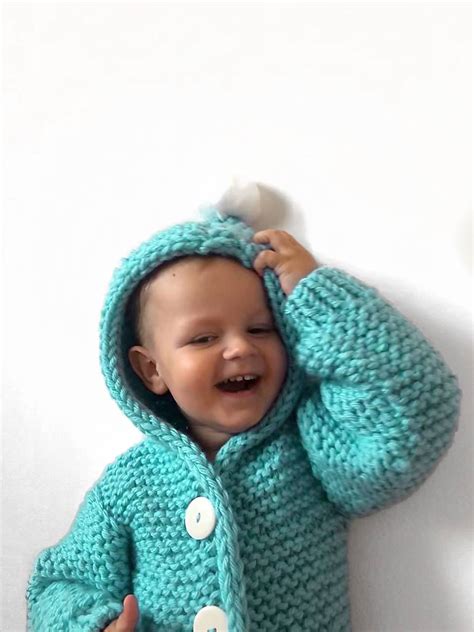 hotový pletený detský sveter s kapucňou