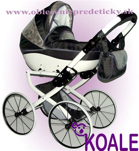 Detail dreveného retro kočíka pre bábiky